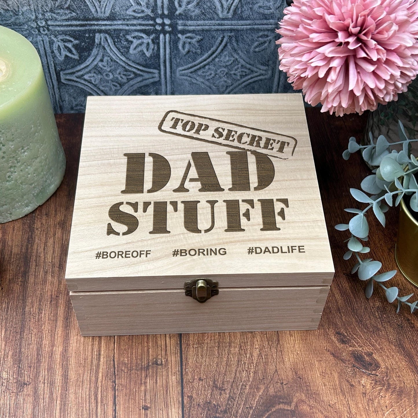 a wooden box sitting on top of a wooden table