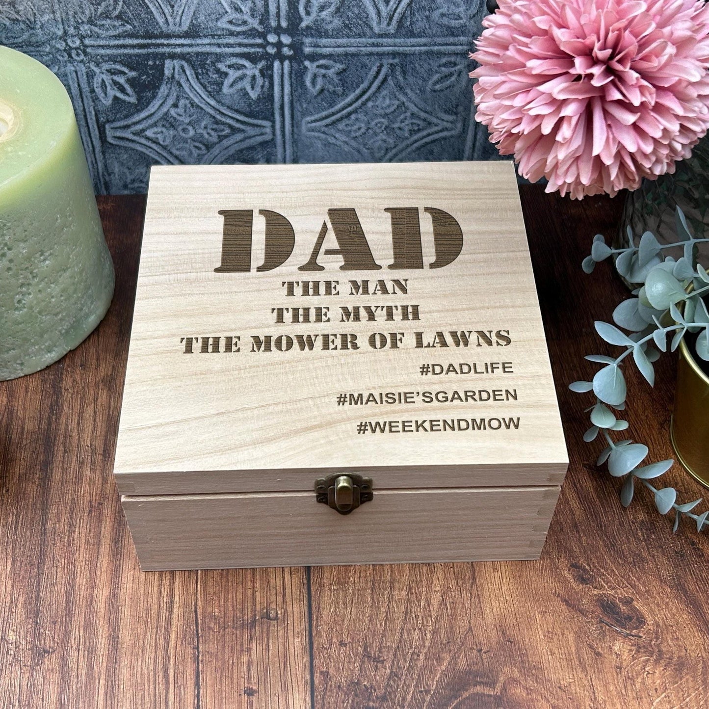 a wooden box sitting on top of a wooden table