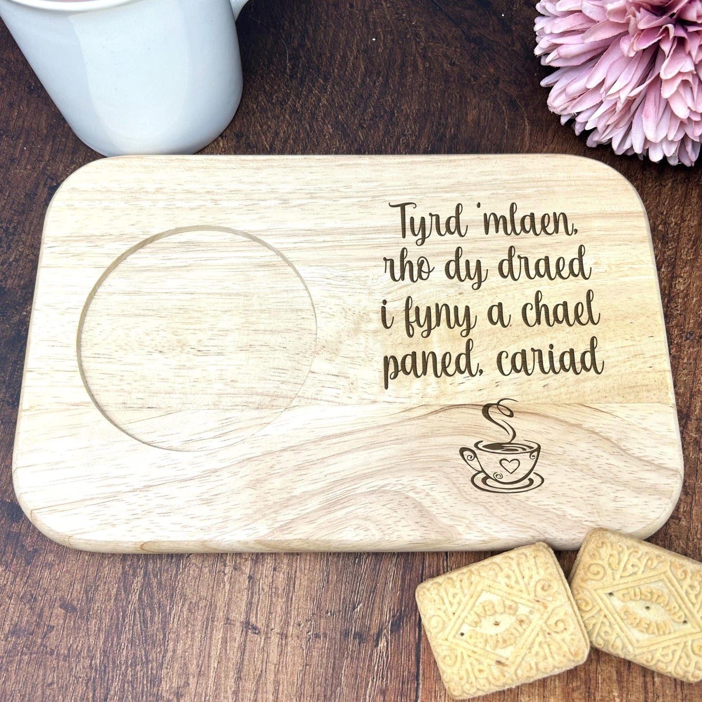 a wooden coaster with a quote on it