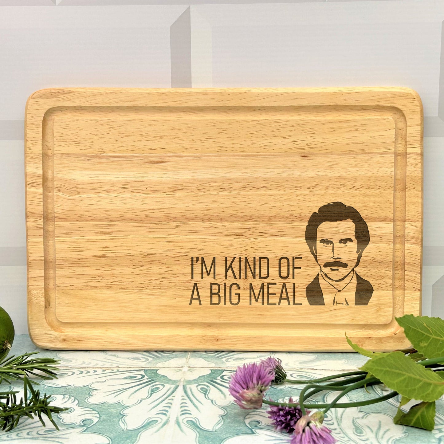 a wooden cutting board with the words i'm kind of a big meal on