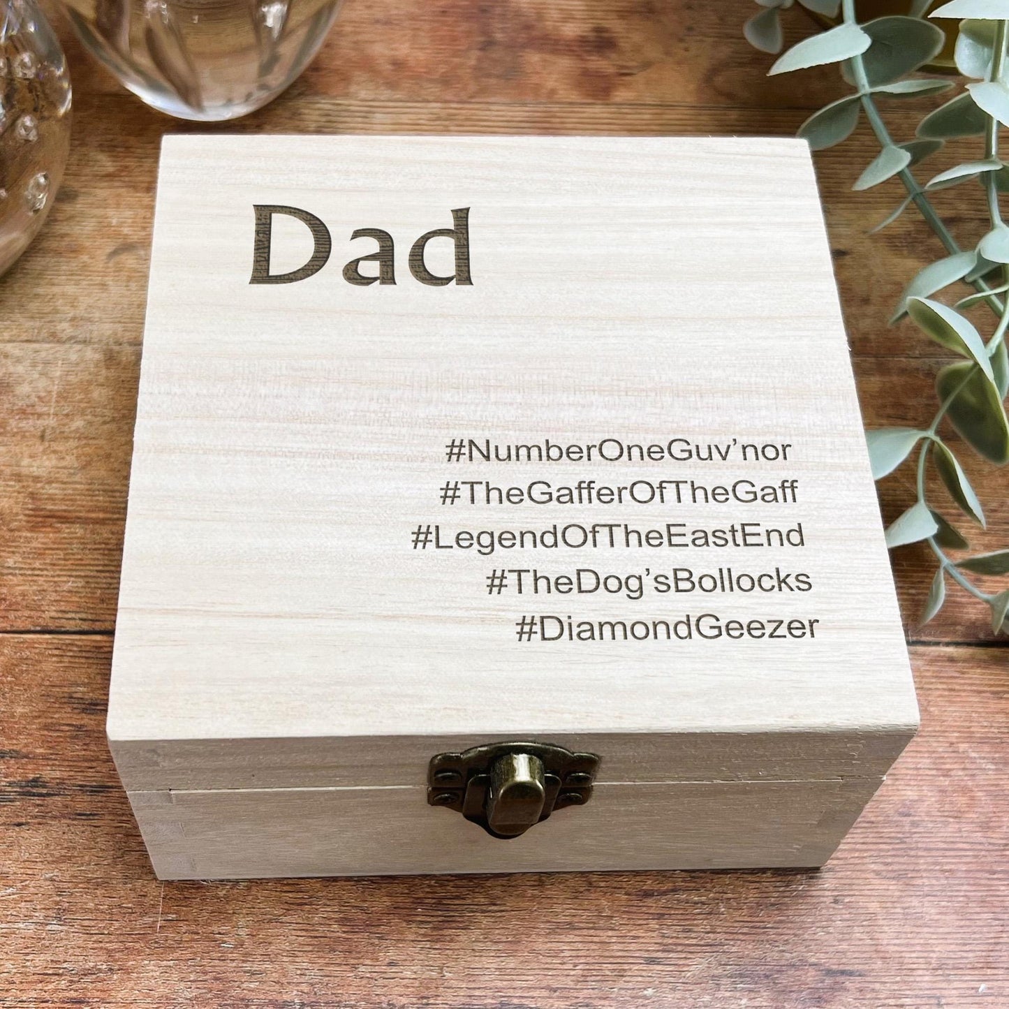 a wooden box with the words dad written on it