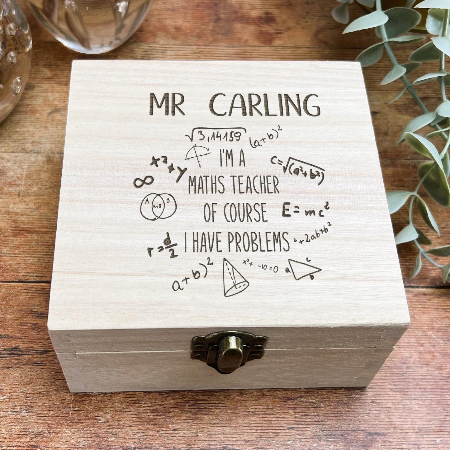 a wooden box that has writing on it