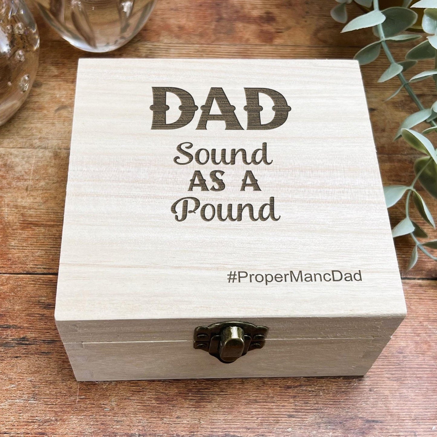 a wooden box that says dad sound as a pound