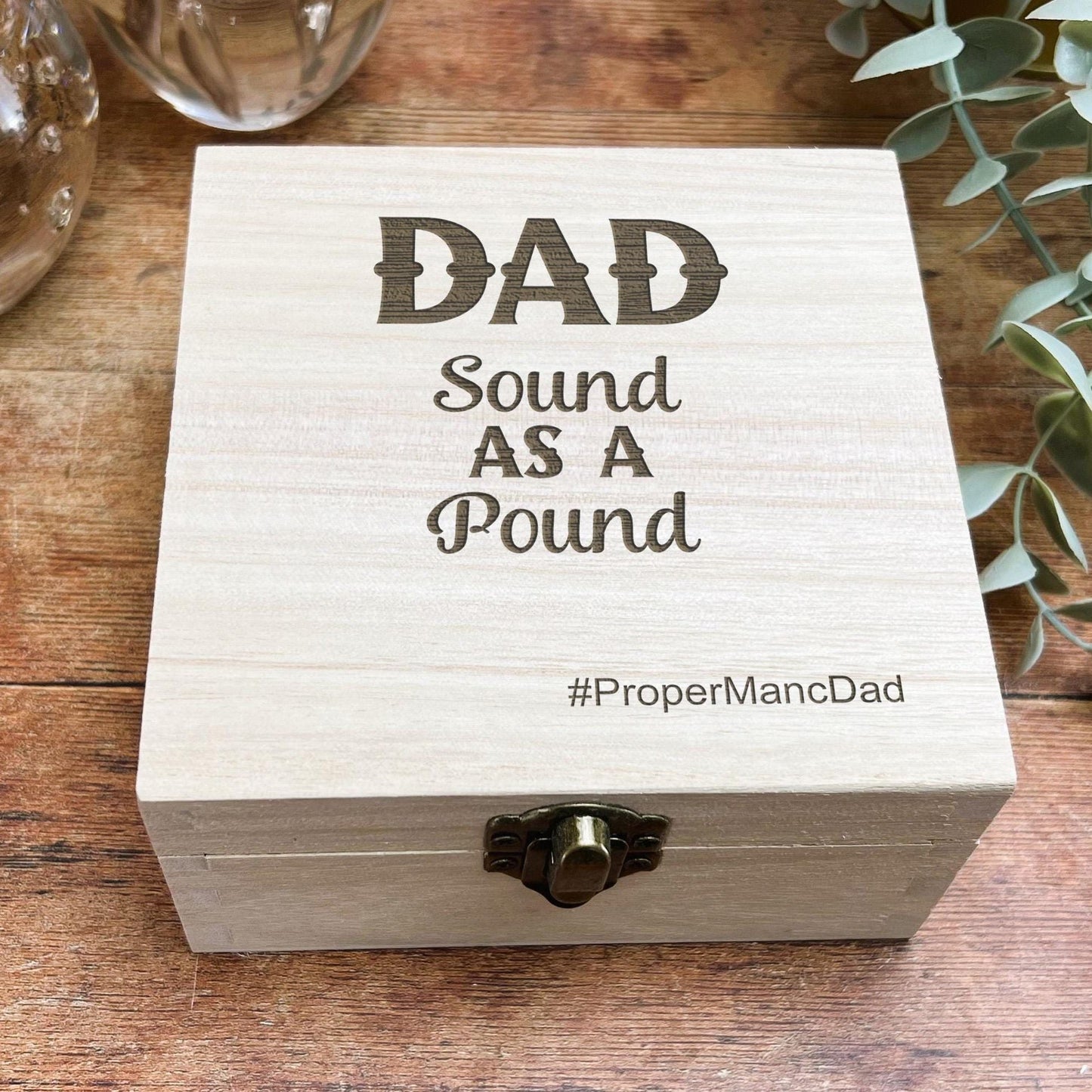 a wooden box that says dad sound as a pound