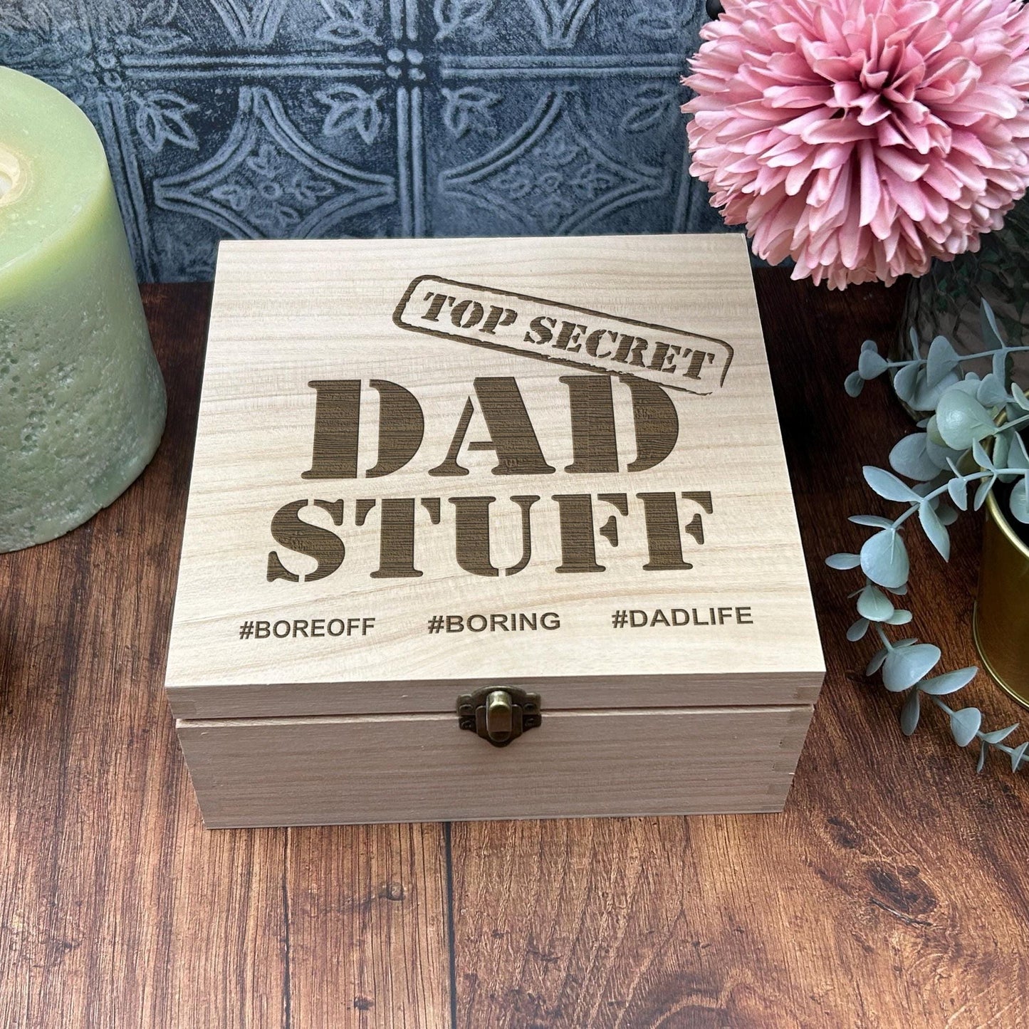a wooden box sitting on top of a wooden table