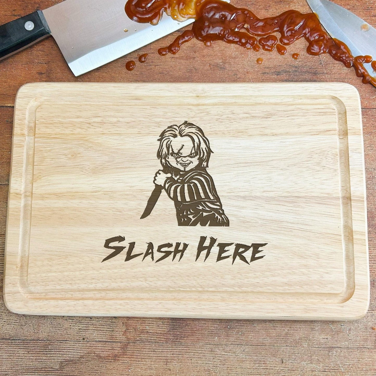 a wooden cutting board with a cartoon of a person holding a knife