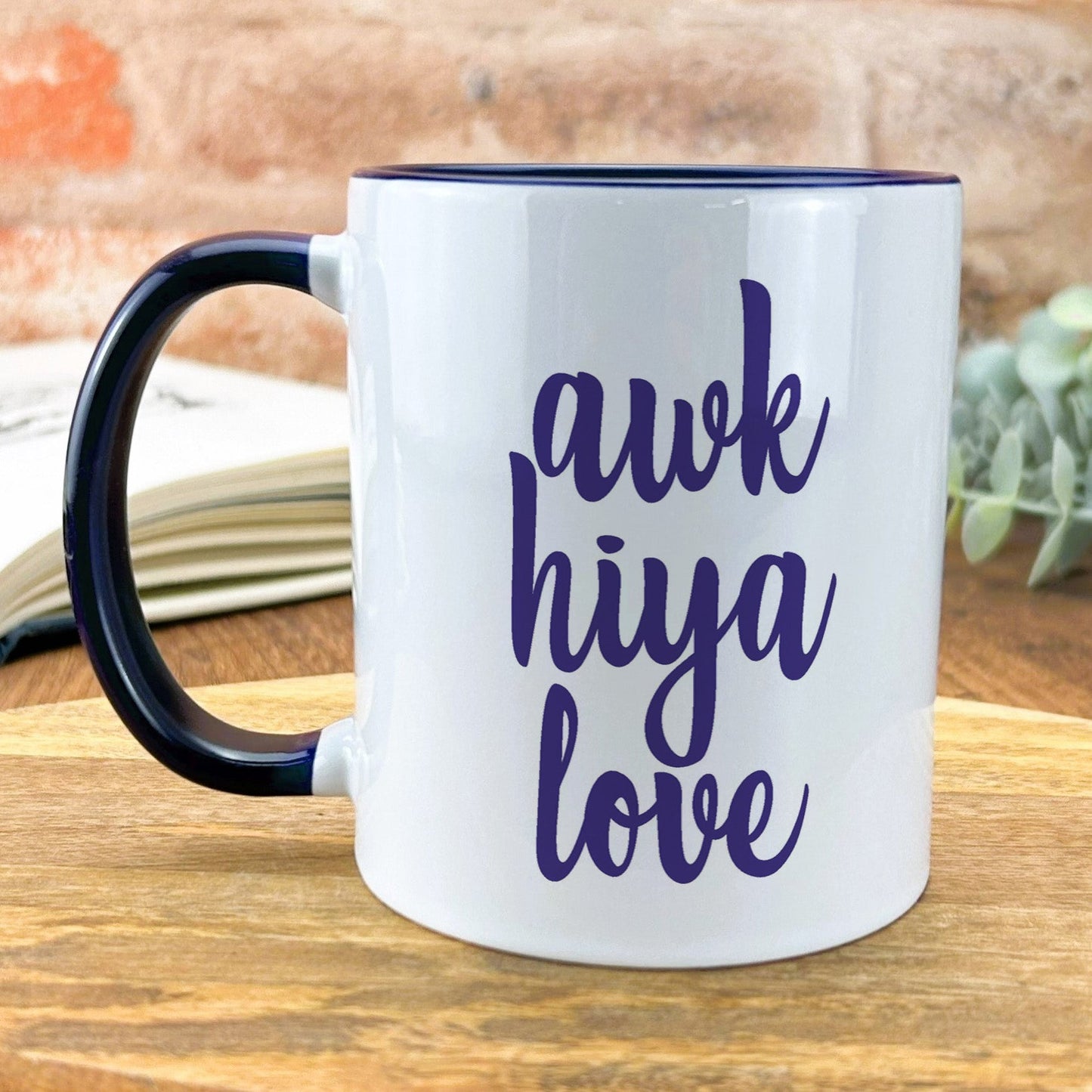 a black and white coffee mug with the words ask hiya love on it