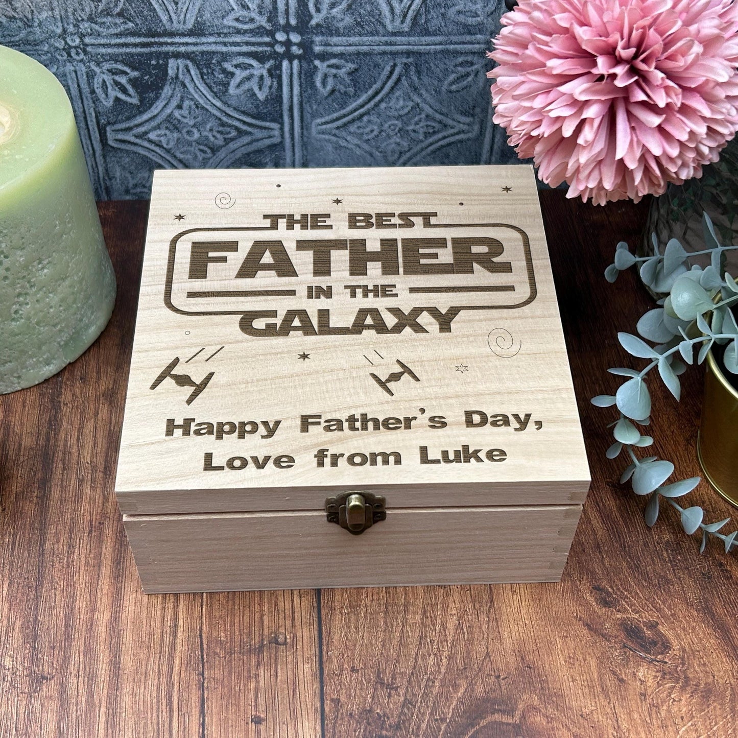 a wooden box sitting on top of a wooden table