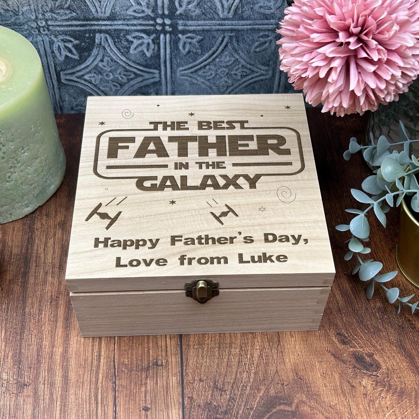 a wooden box sitting on top of a wooden table