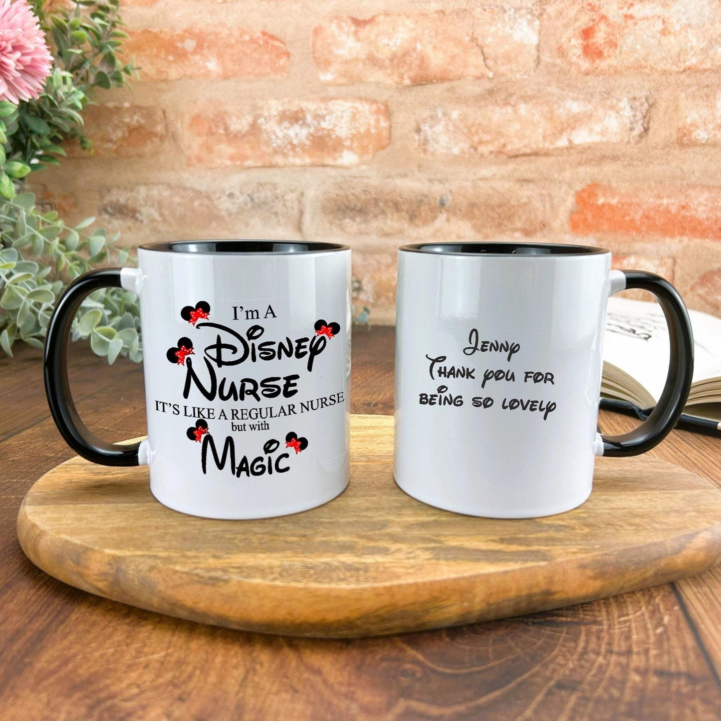 two coffee mugs sitting on top of a wooden tray