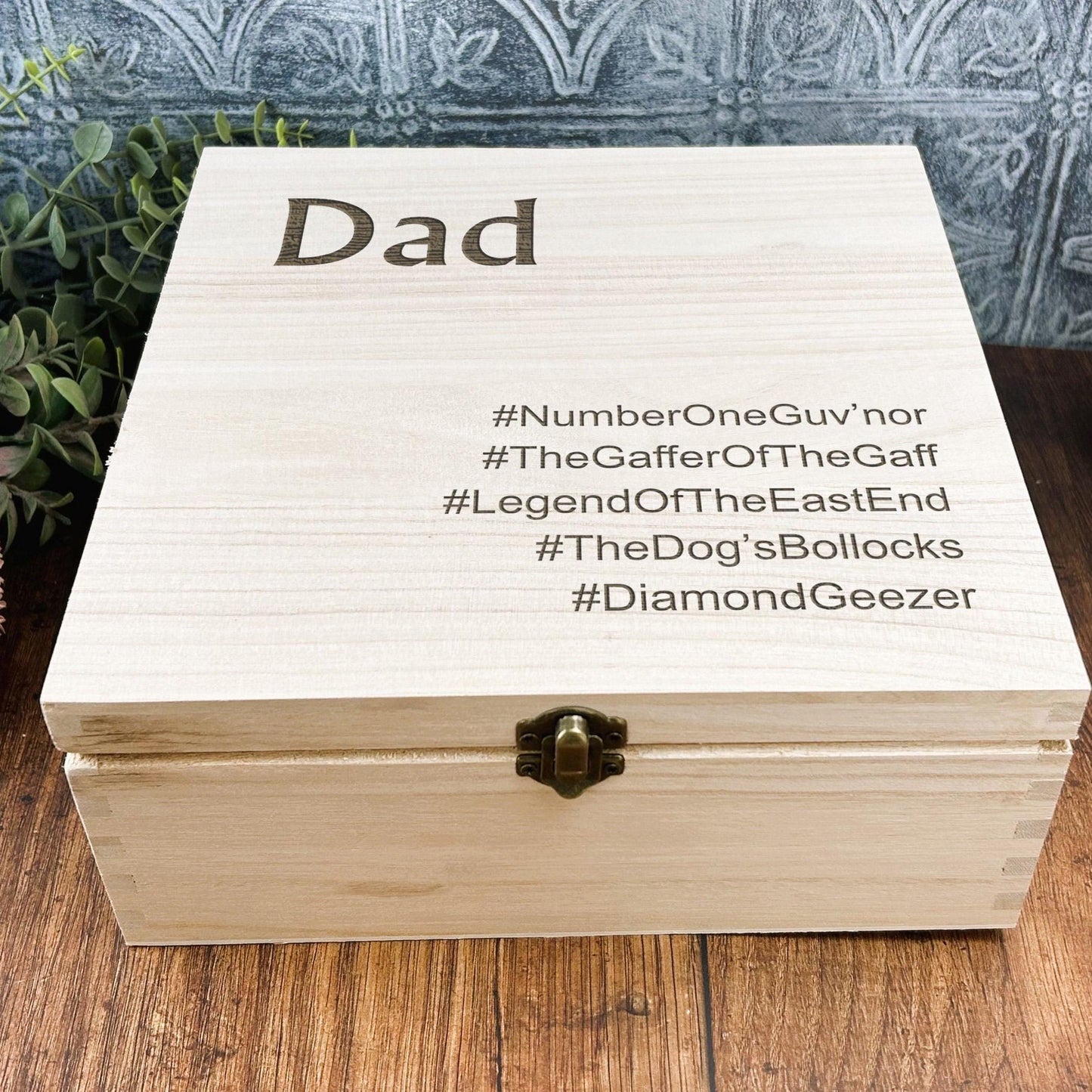 a wooden box sitting on top of a wooden table