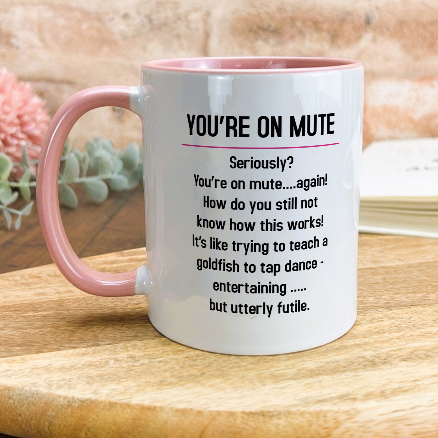 a pink and white coffee mug with a poem on it
