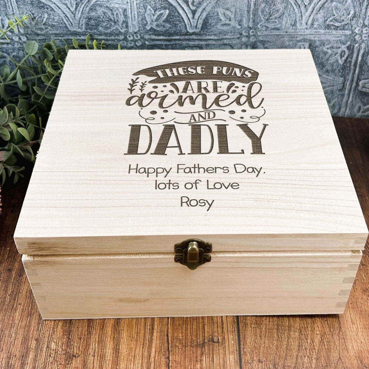 a wooden box sitting on top of a wooden table
