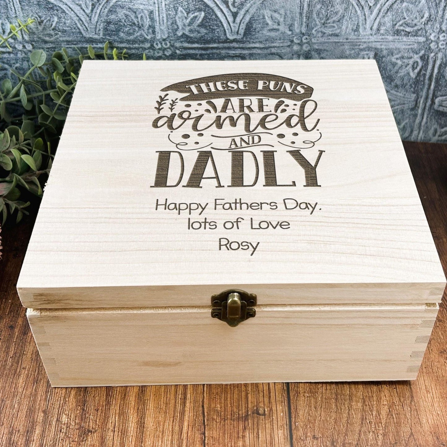 a wooden box sitting on top of a wooden table