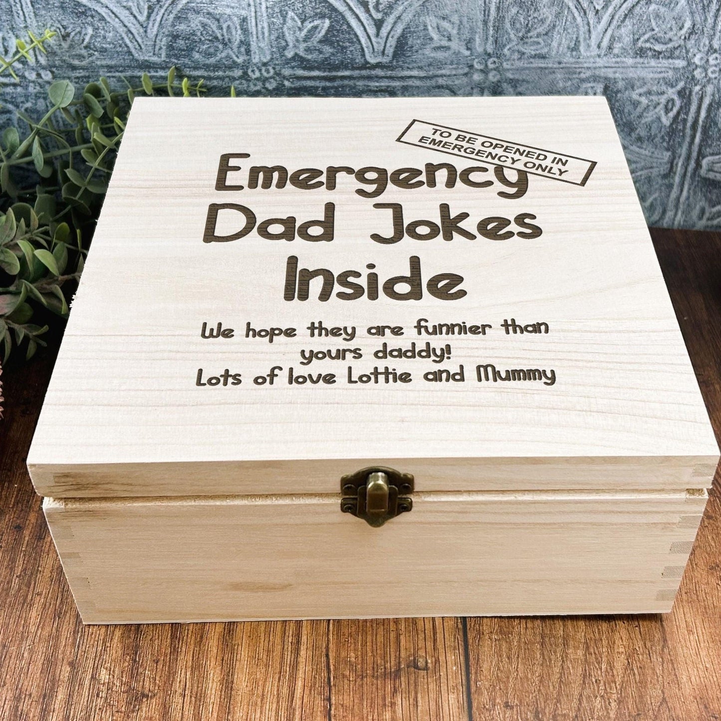 a wooden box sitting on top of a wooden table