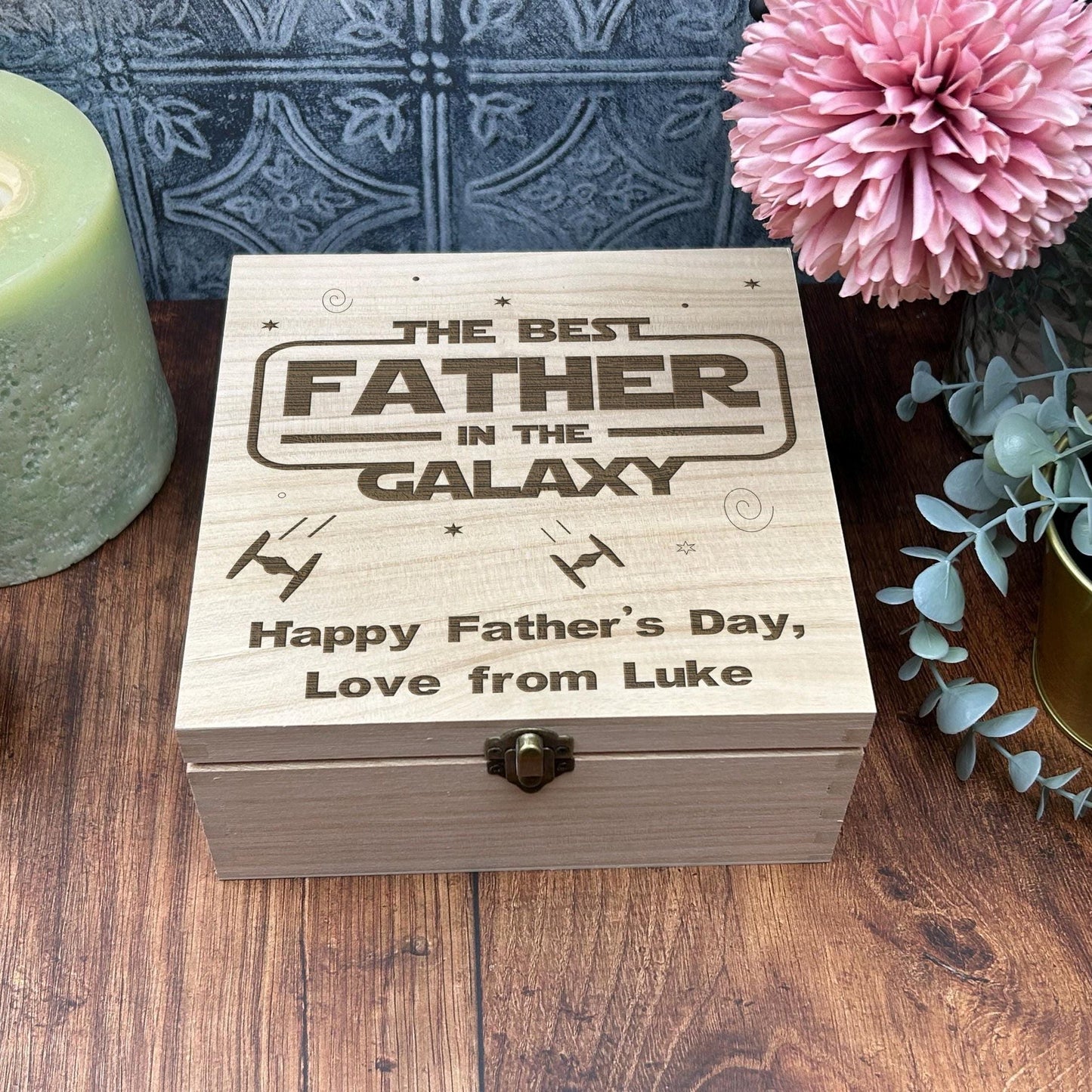 a wooden box sitting on top of a wooden table
