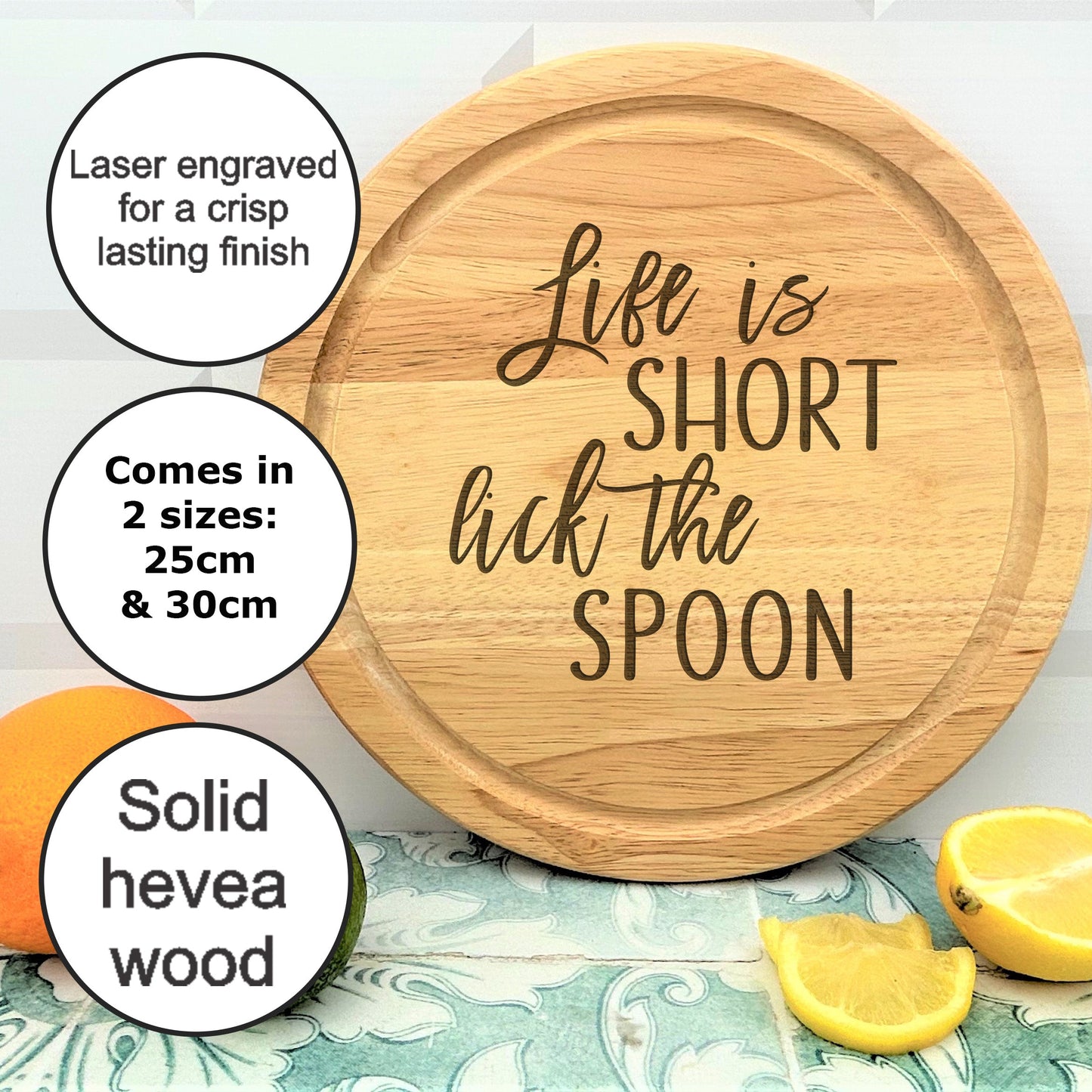 a wooden cutting board with the words life is short but the spoon