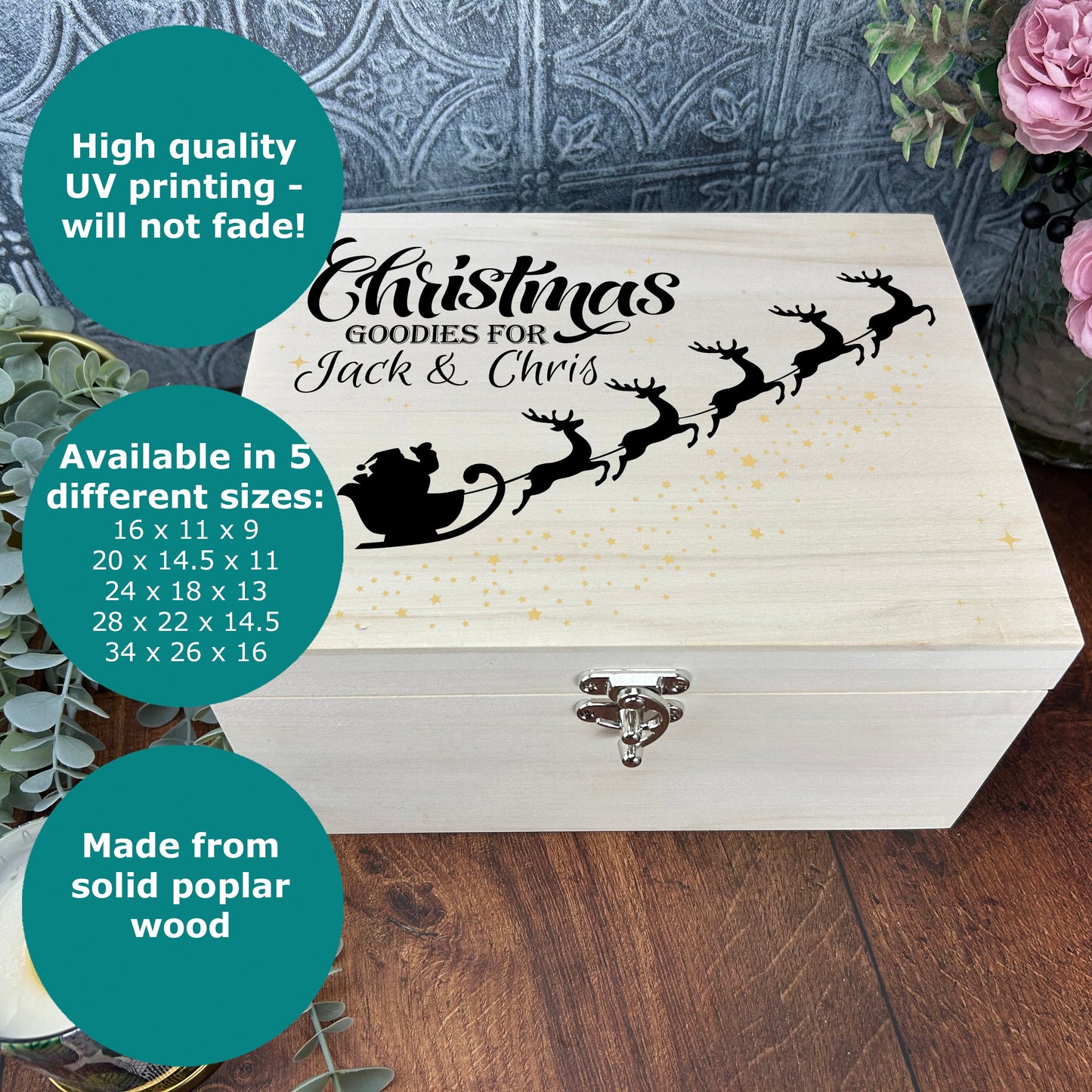 a wooden box with a picture of a santa's sleigh on it
