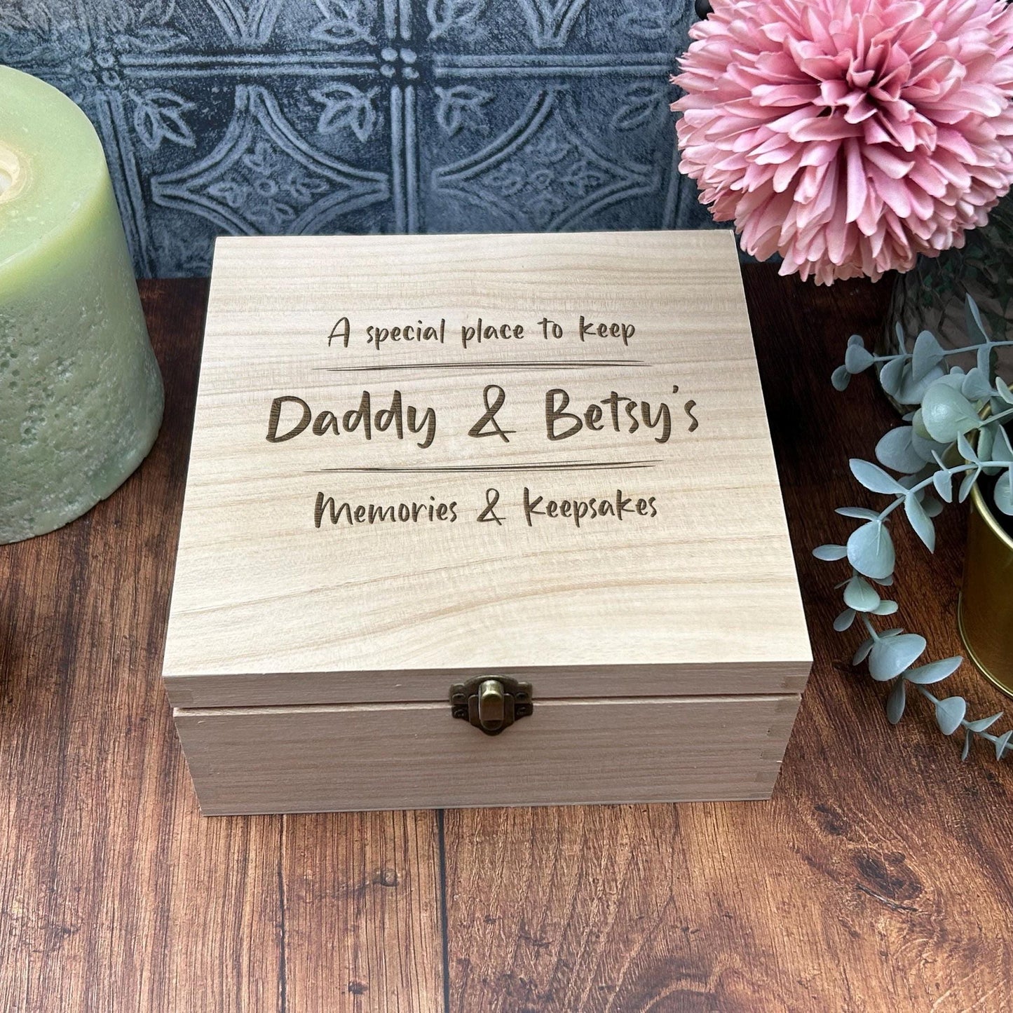 a wooden box sitting on top of a wooden table