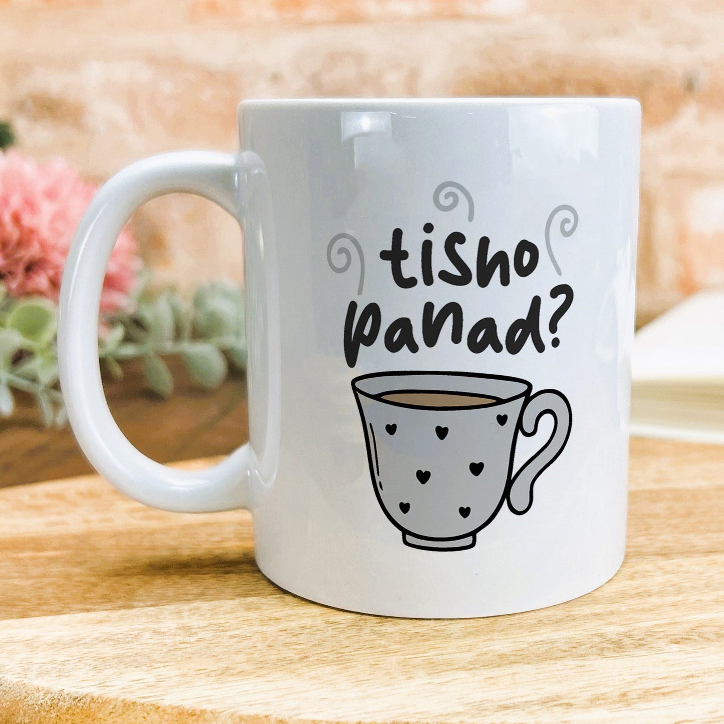 a white coffee mug with the words fish panda on it