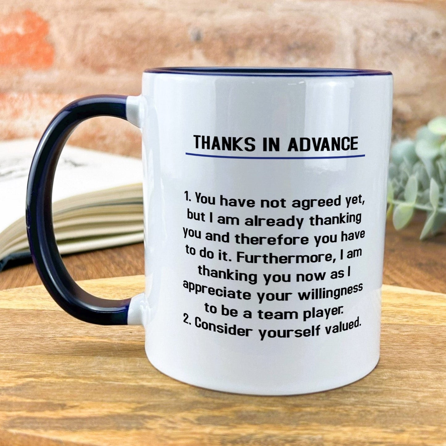 a black and white coffee mug with a poem on it