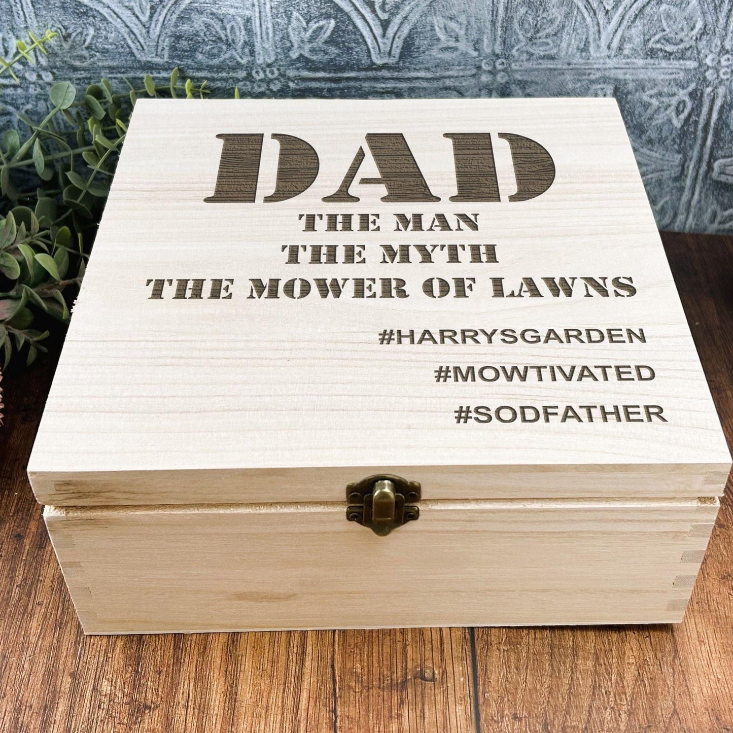 a wooden box sitting on top of a wooden table