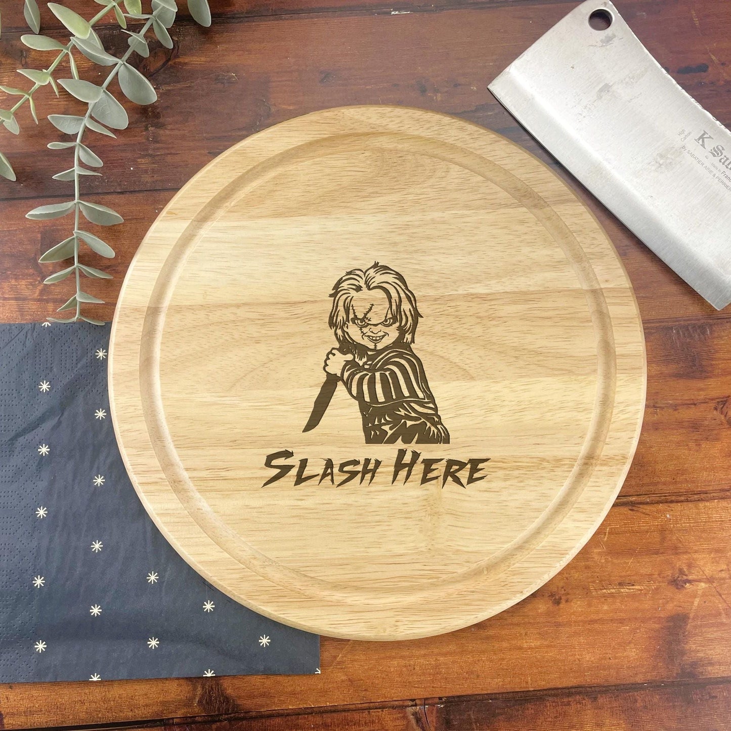 a wooden cutting board with a cartoon of a woman holding a knife