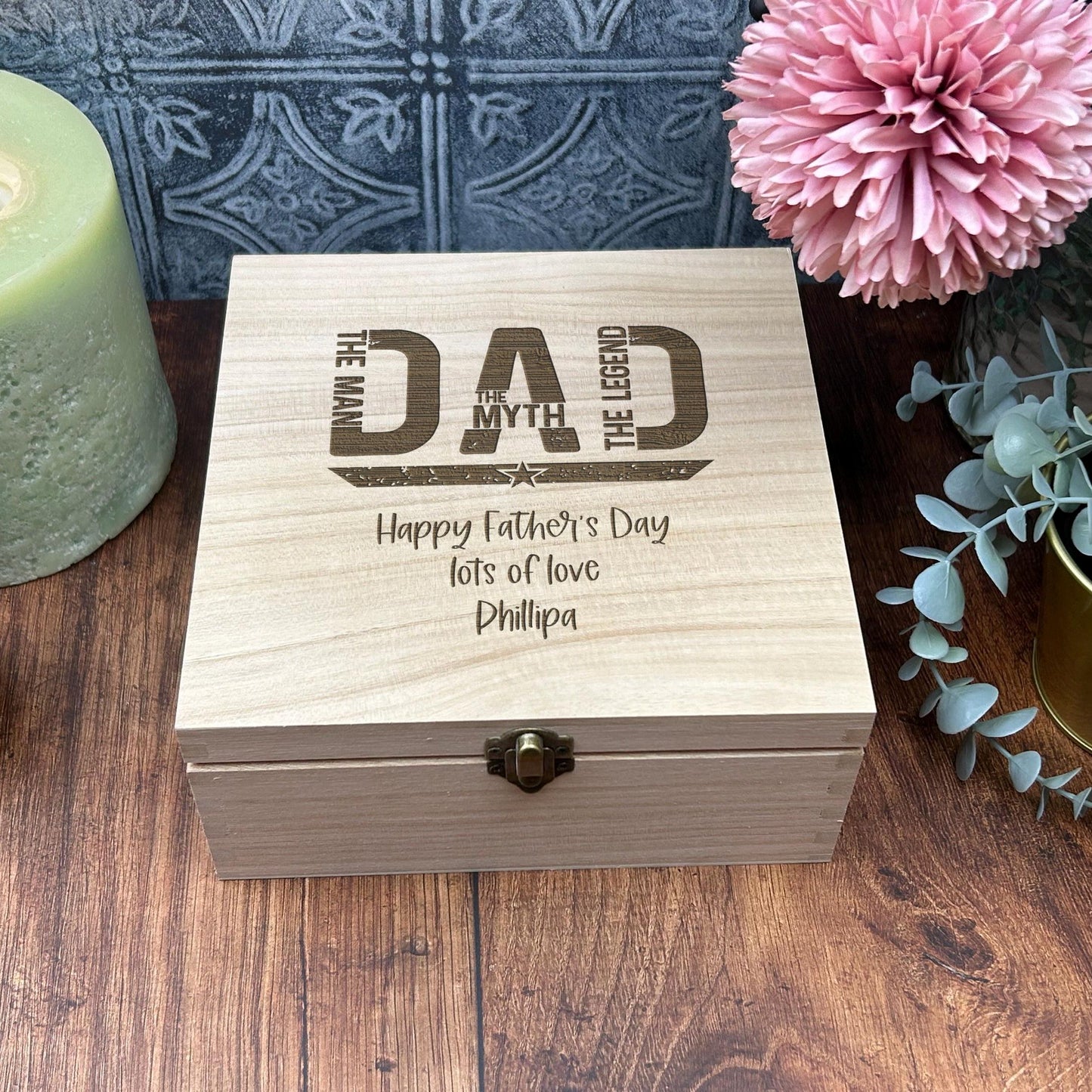 a wooden box sitting on top of a wooden table