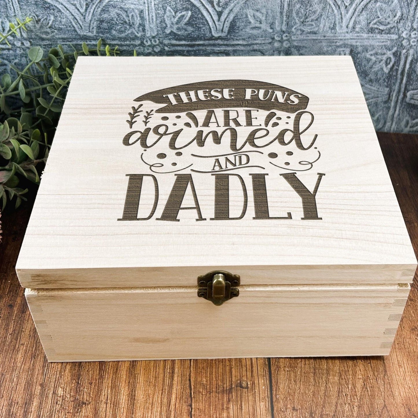 a wooden box sitting on top of a wooden table