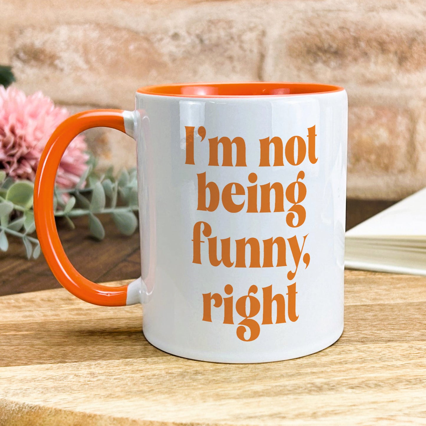 a coffee mug that says i'm not being funny, right