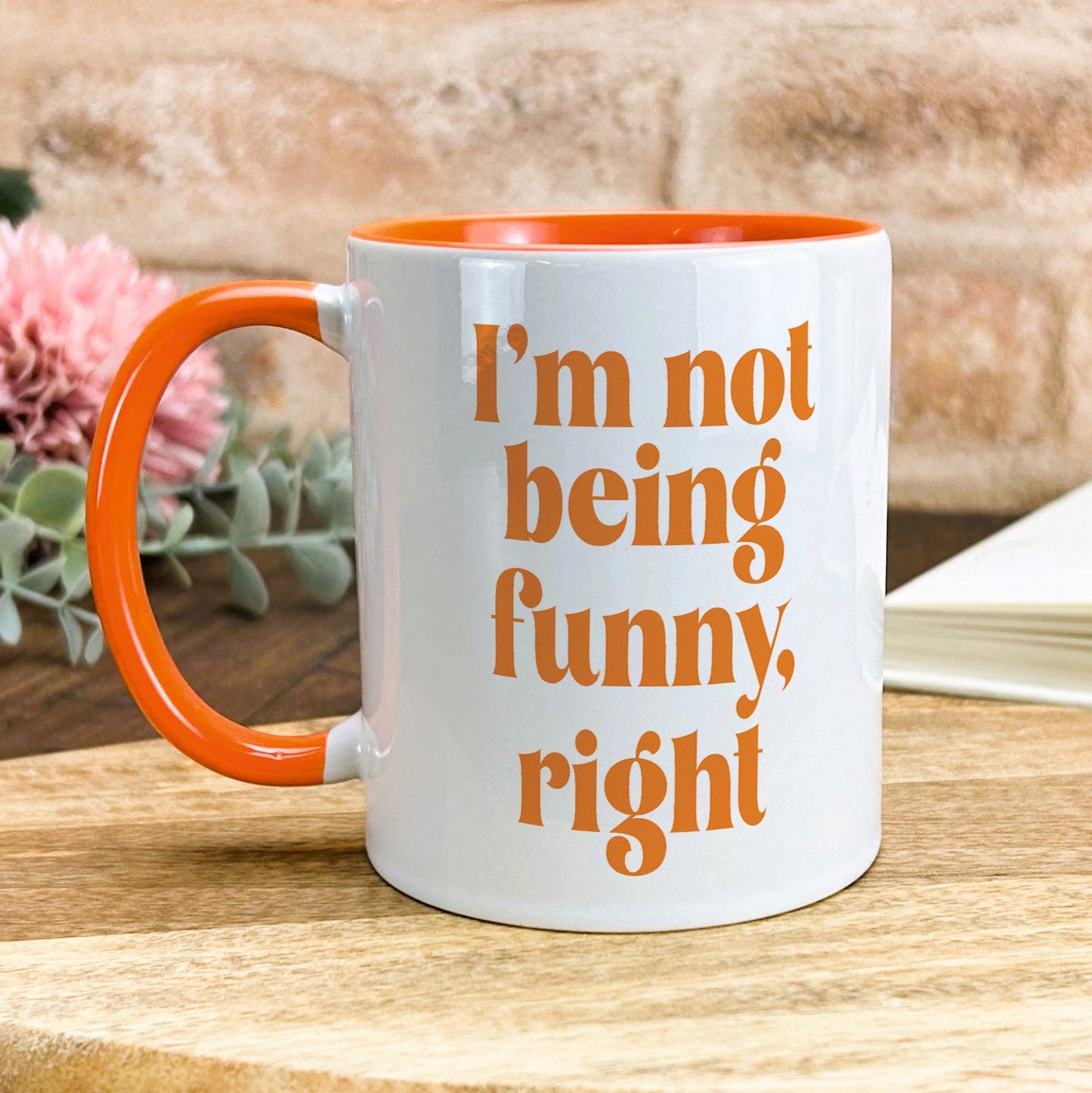 a coffee mug that says i'm not being funny, right