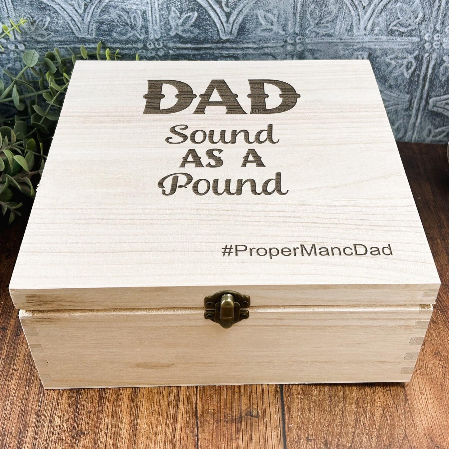 a wooden box that says dad sound as a pound
