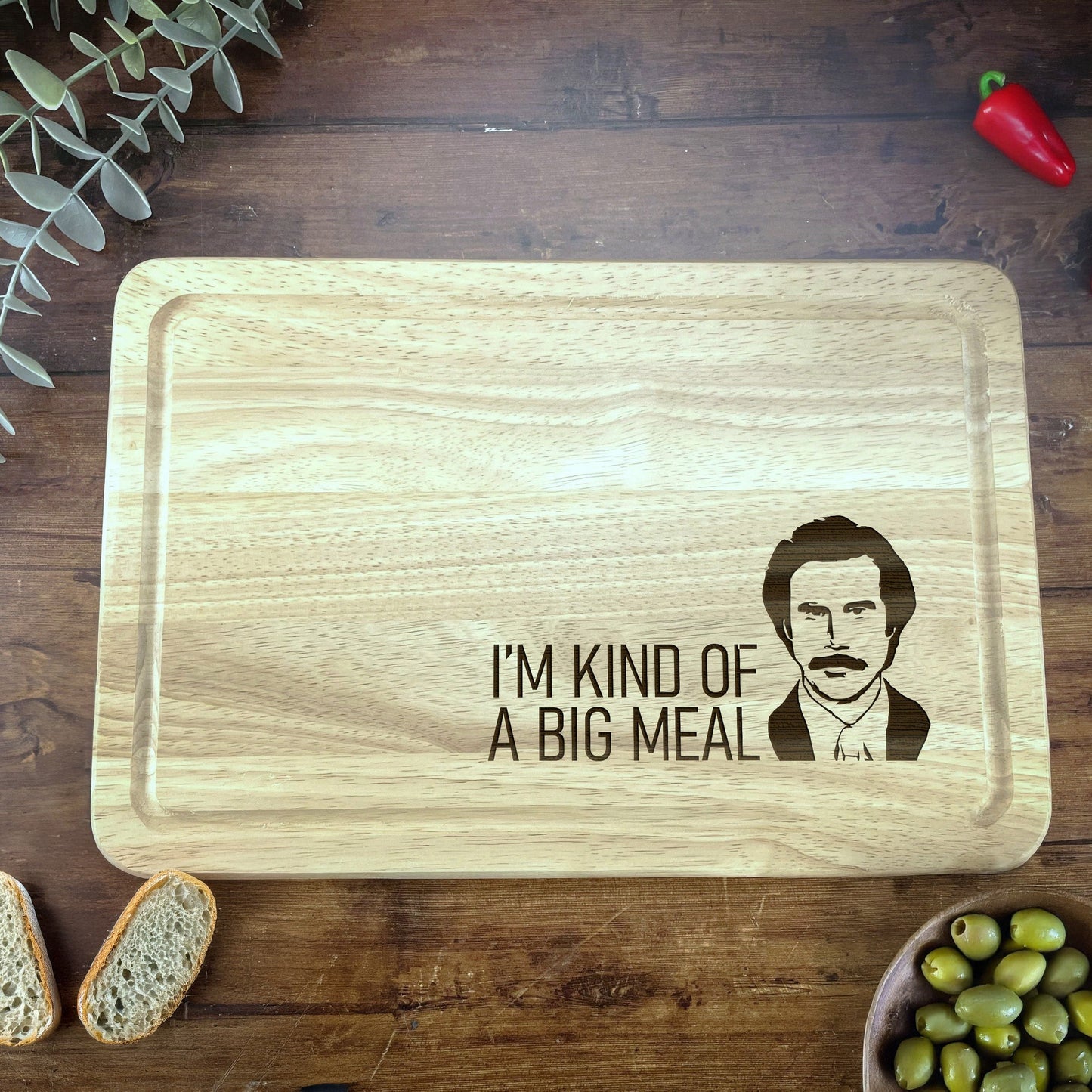 a cutting board with a picture of a man on it