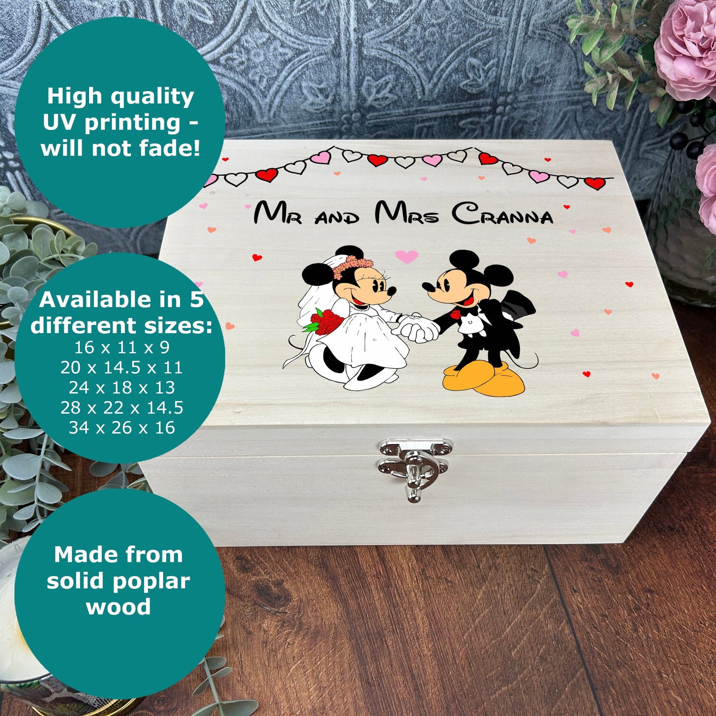 a wooden box with a picture of mickey and minnie on it