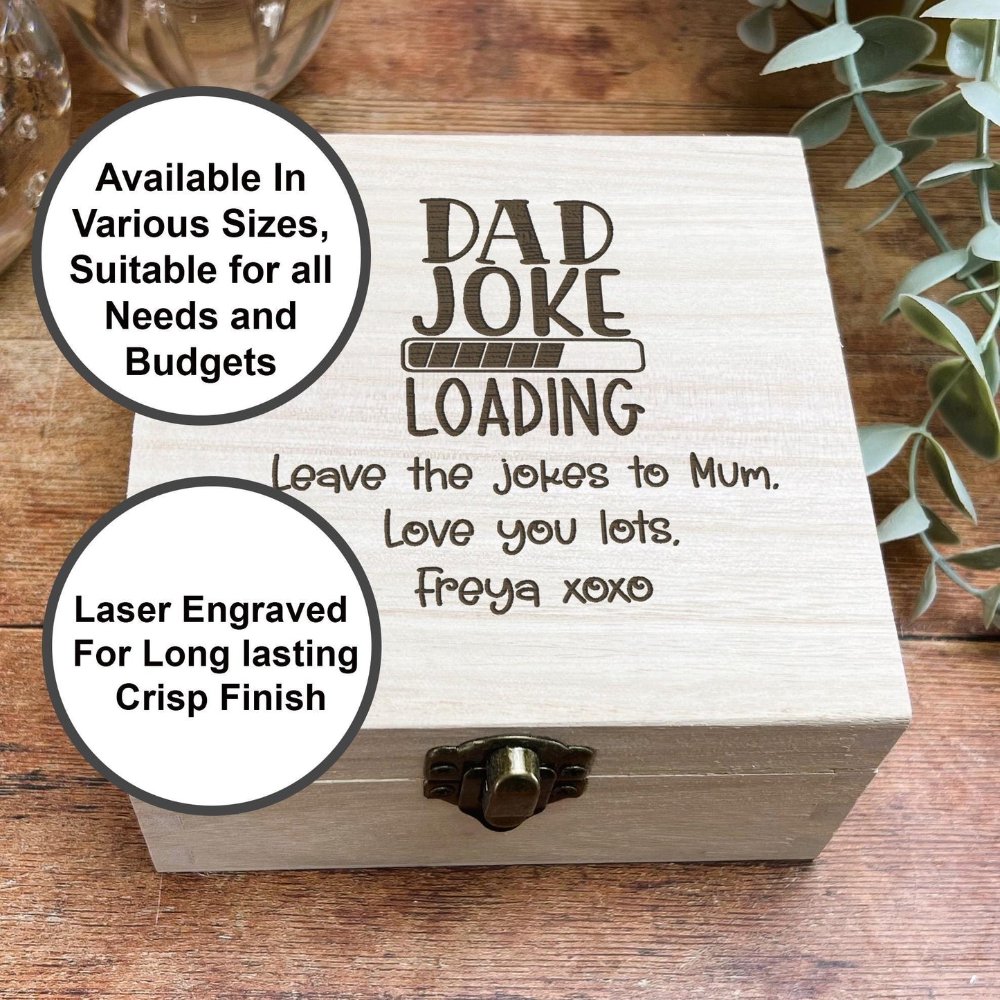 a wooden box with a picture of a joke on it