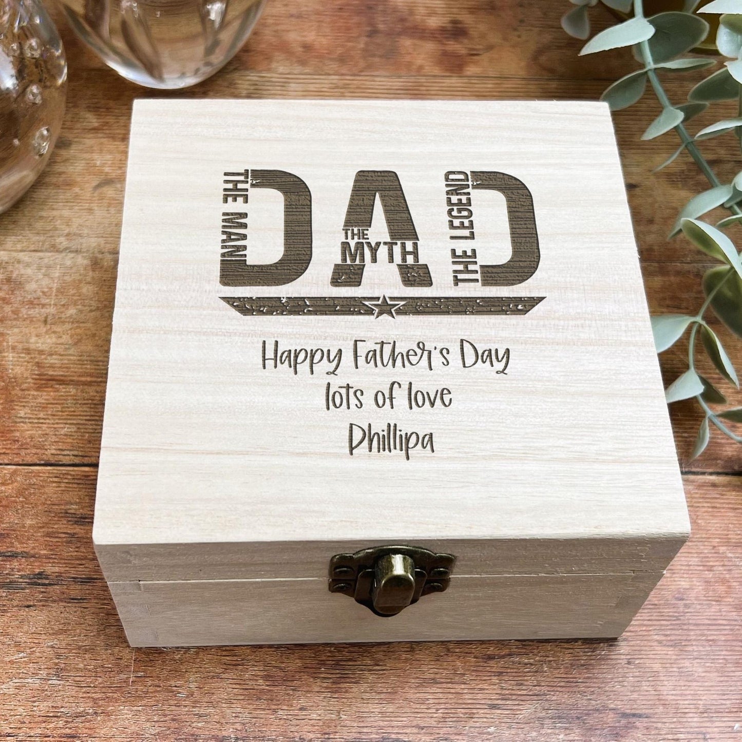 a wooden box with a message on it