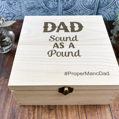 a wooden box sitting on top of a wooden table