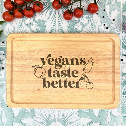 a cutting board that says vegans taste better