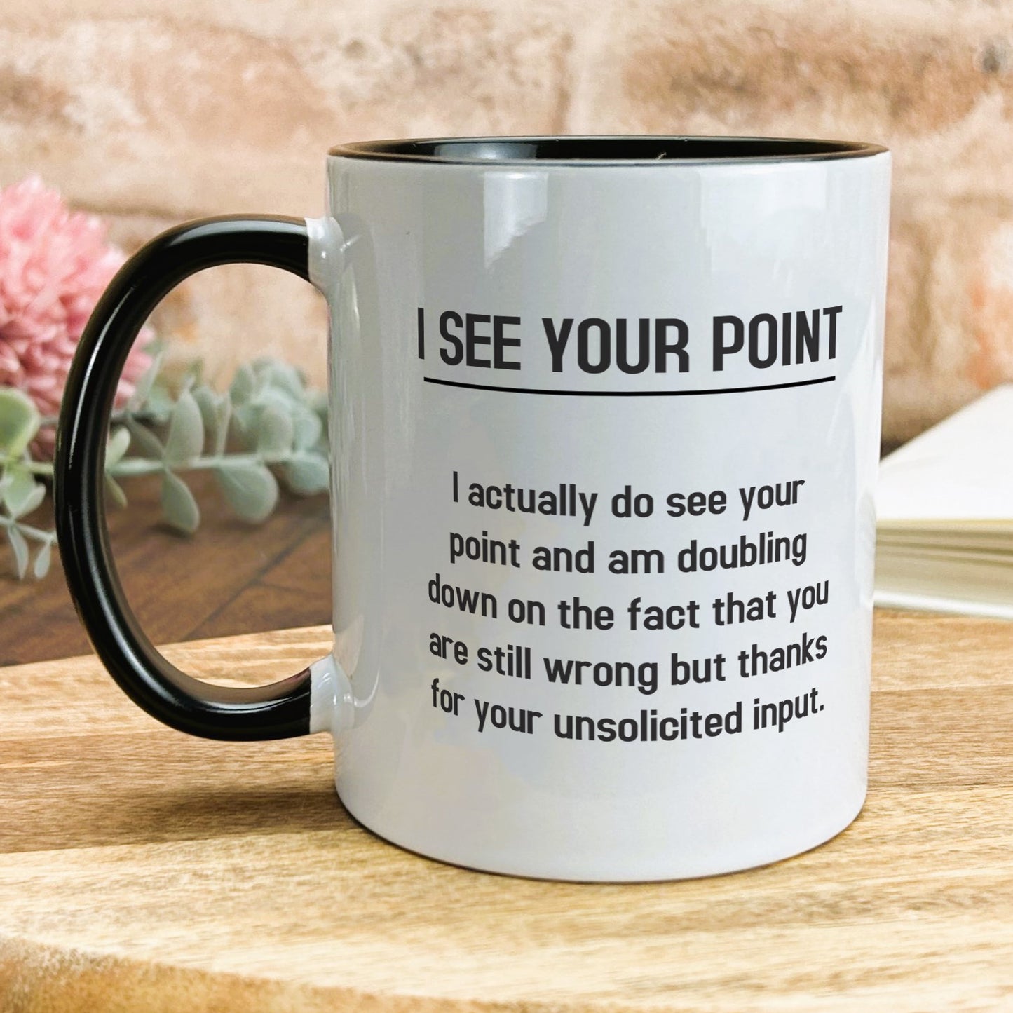 a black and white coffee mug with a poem on it