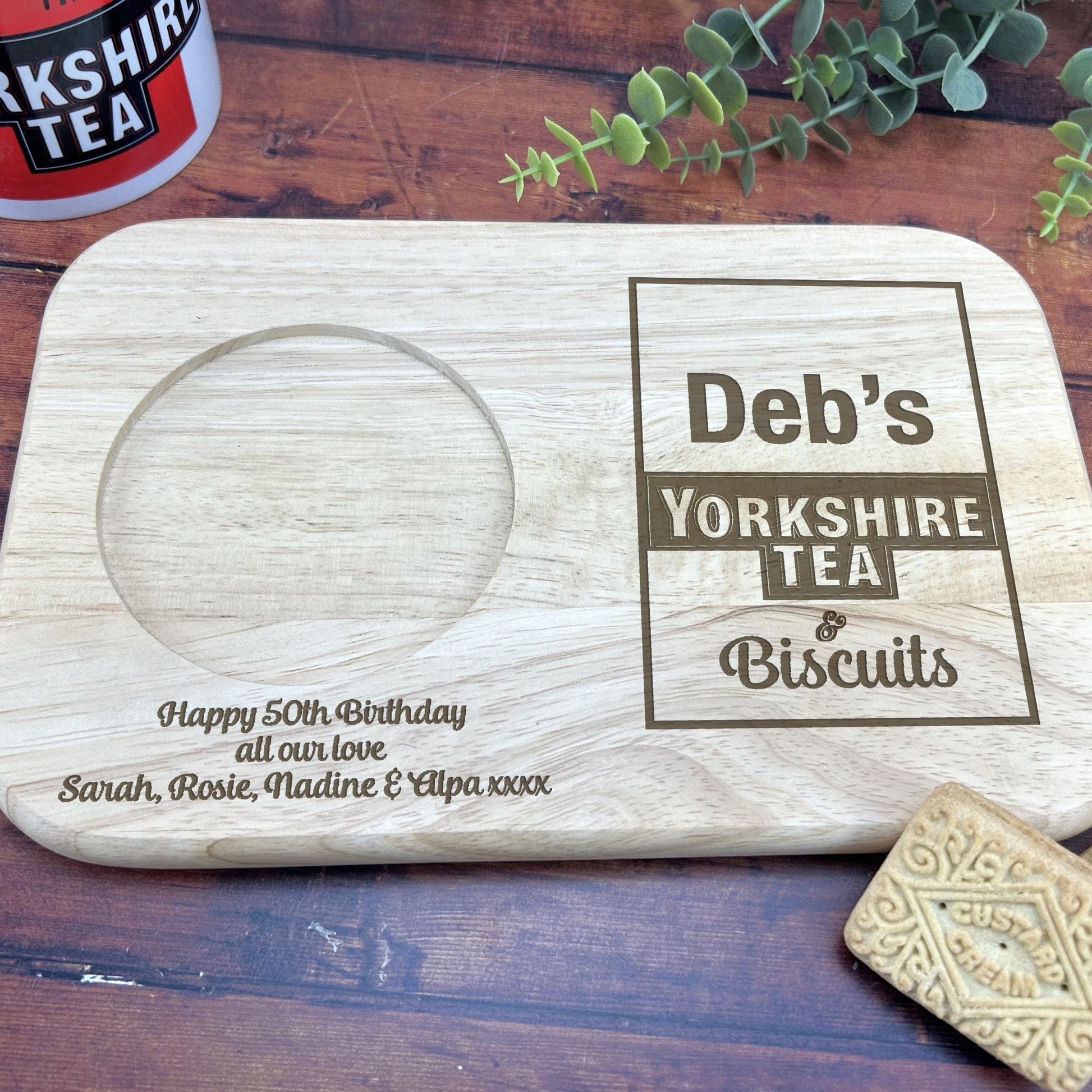 a personalized cutting board with a coaster on it