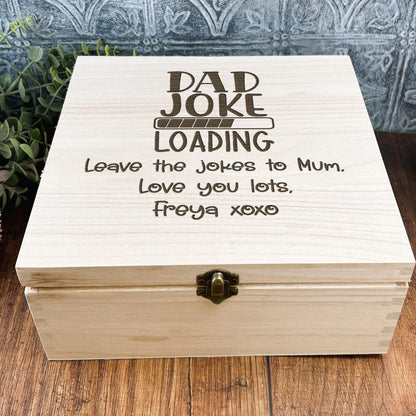 a wooden box sitting on top of a wooden table