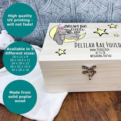 a wooden box with a picture of an elephant on it