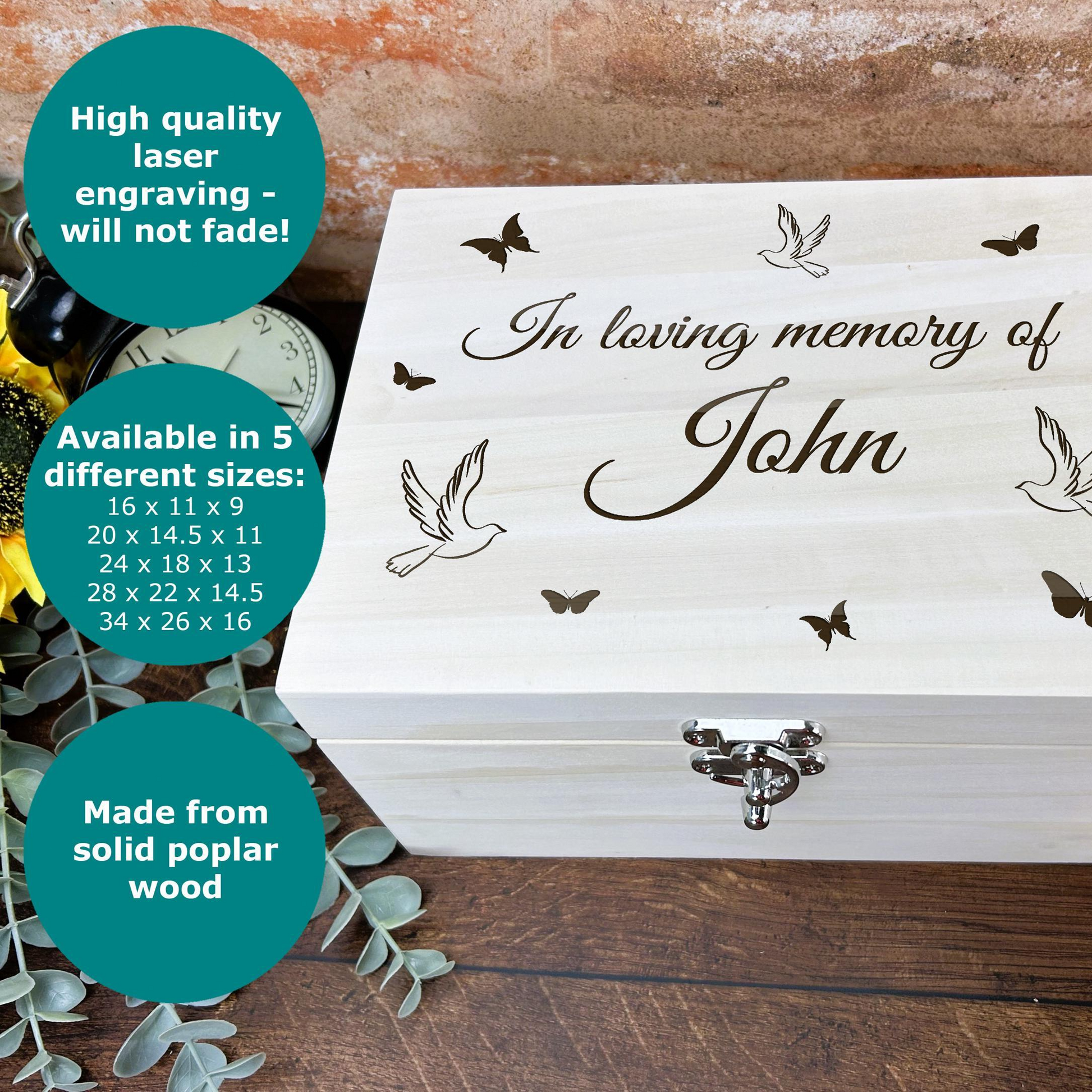 a wooden box with a picture of a flower and butterflies on it