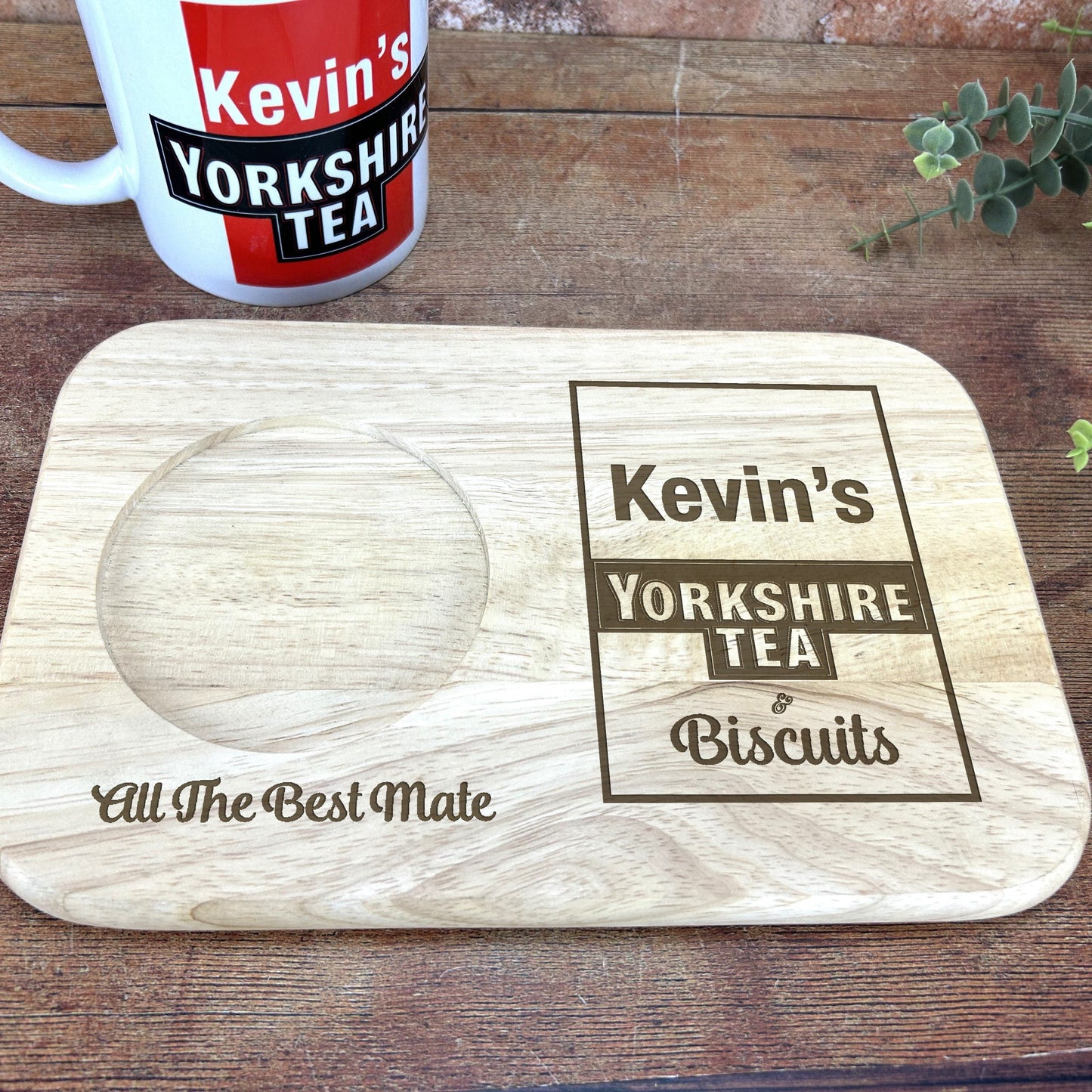 a cup of tea and a wooden coaster on a table