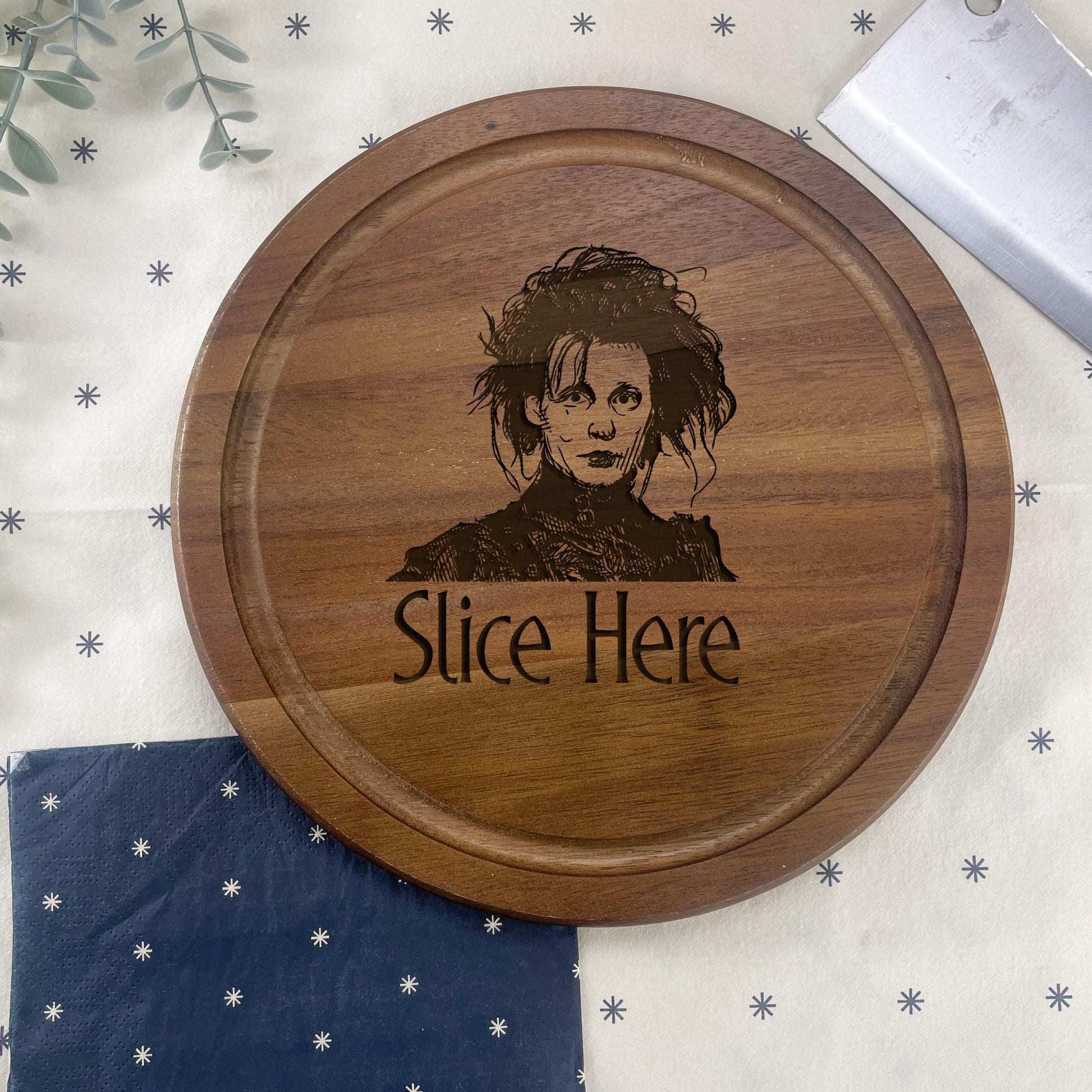 a wooden plate with a picture of a woman on it