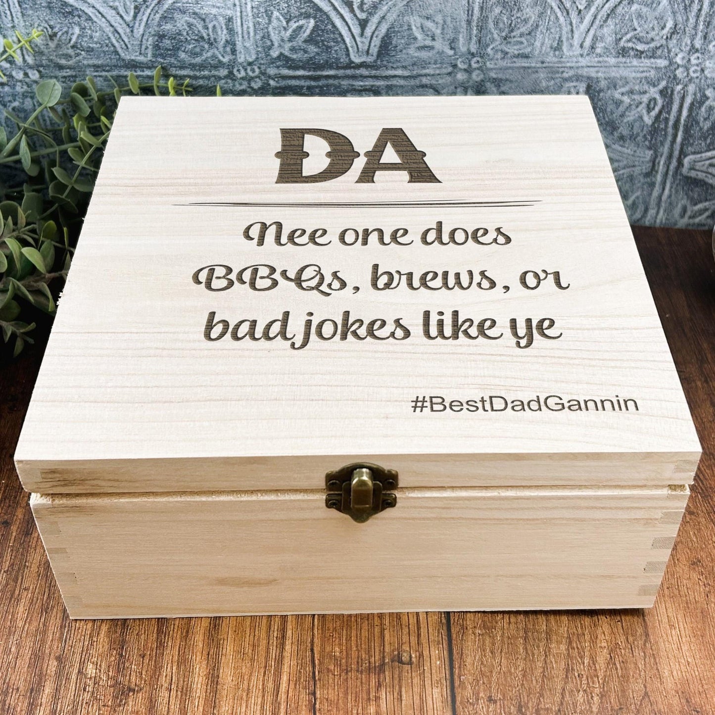 a wooden box sitting on top of a wooden table