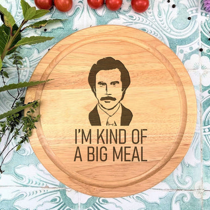 a cutting board with a picture of a man on it