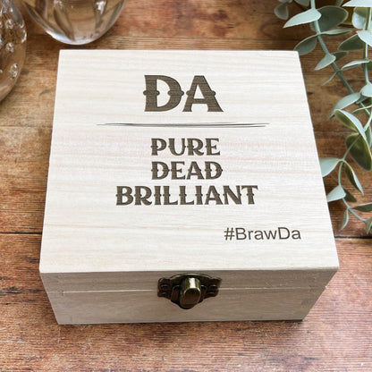 a wooden box that says da pure dead brilliant