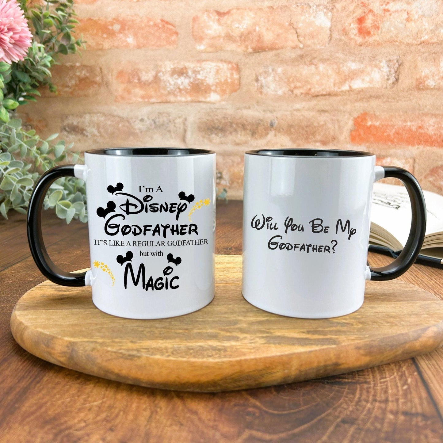 two coffee mugs sitting on top of a wooden tray