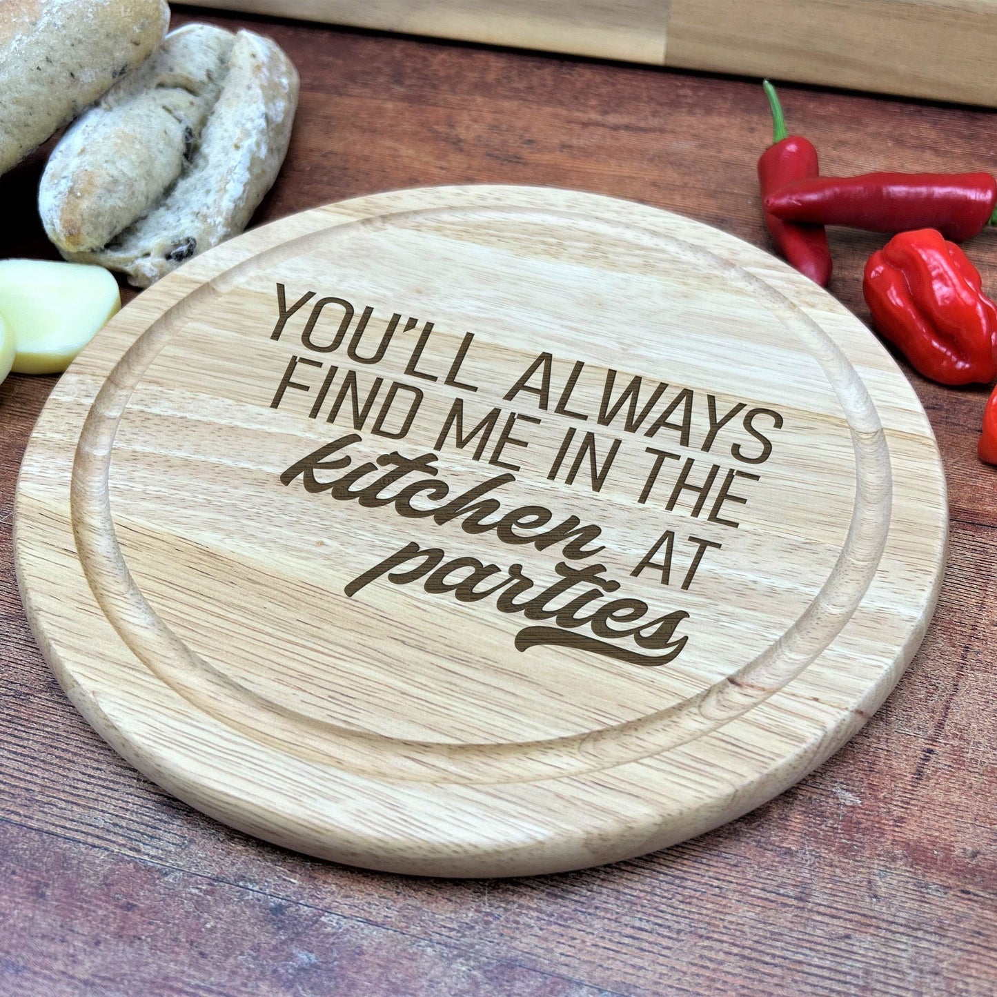 a wooden cutting board with a quote on it